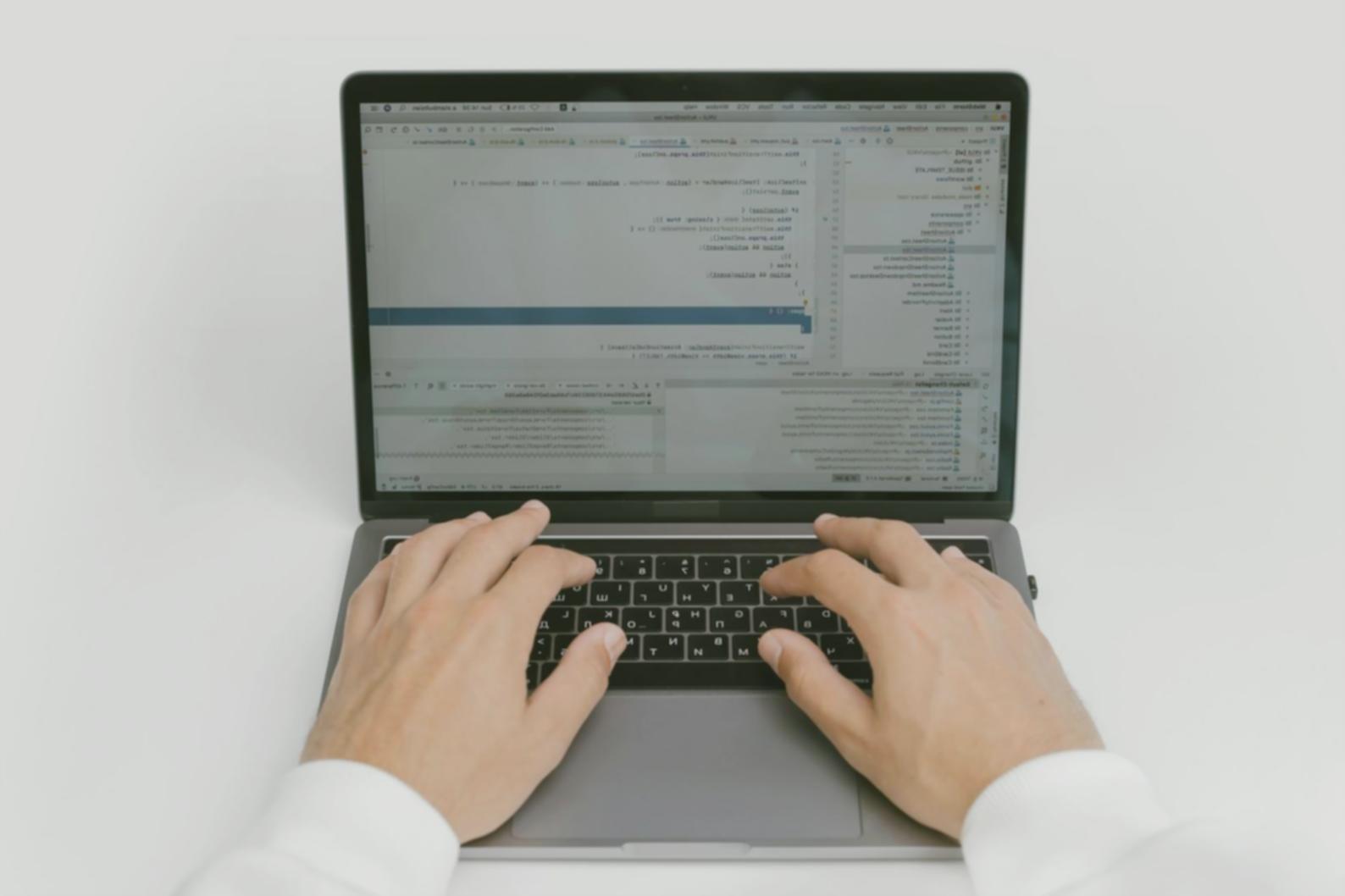 Students collaborating on system programming projects using modern development tools